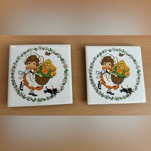 A pair of JASCO Japan trivets. 4 1/4” square.